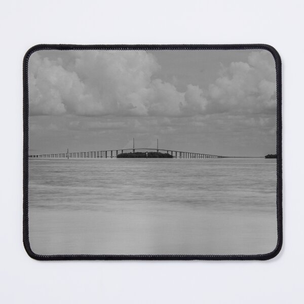 Item preview, A serene black and white scene features the long Sunshine Skyway Bridge extending over a calm body of Tampa Bay designed and sold by EyezWatchin.