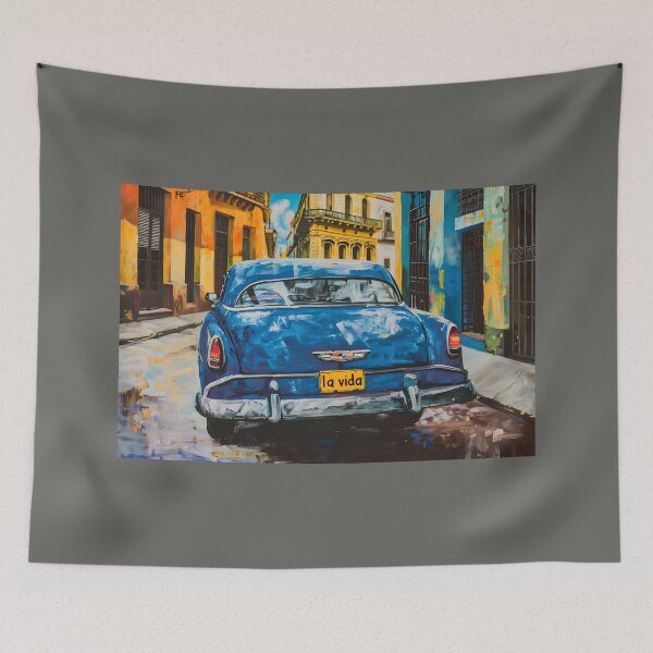 Item preview, Classic Blue Car with La Vida License Plate Drives Through Vibrant Havana Street designed and sold by OlfactoART Studio.