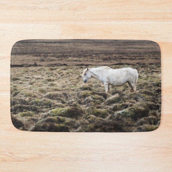 Item preview, A white Icelandic horse stands alone in the storm in the barren landscape of Iceland designed and sold by Sonja Birkelbach.