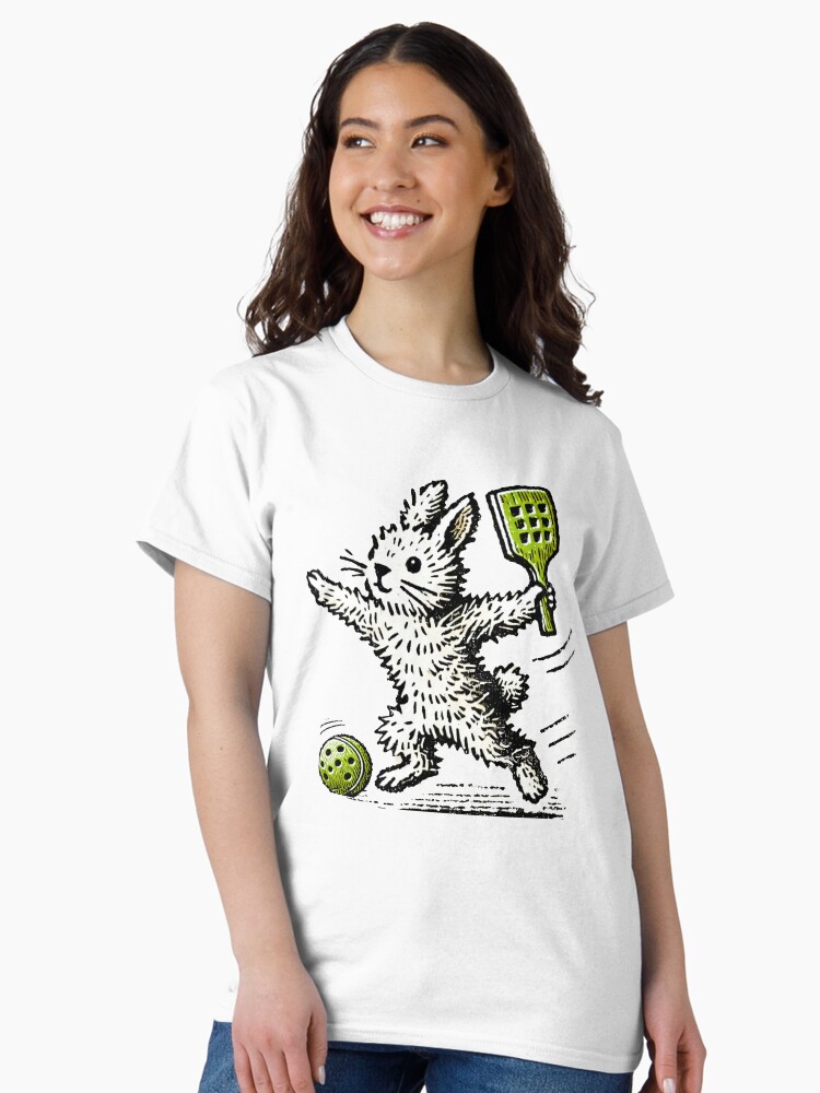 Thumbnail 1 of 7, Classic T-Shirt, Easter Bunny Pickleball Player in Action - Minimalist Animal Art designed and sold by BeaverFriends.