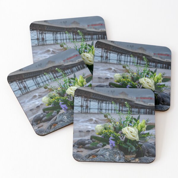 Item preview, Small bunch of flowers at Cromer pier Norfolk Uk designed and sold by RobWalkley.
