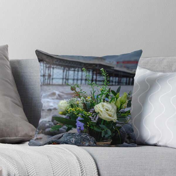 Item preview, Small bunch of flowers at Cromer pier Norfolk Uk designed and sold by RobWalkley.