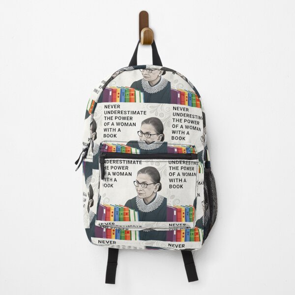 Item preview, Never underestimate the power of a woman with a book designed and sold by TeeARTHY.