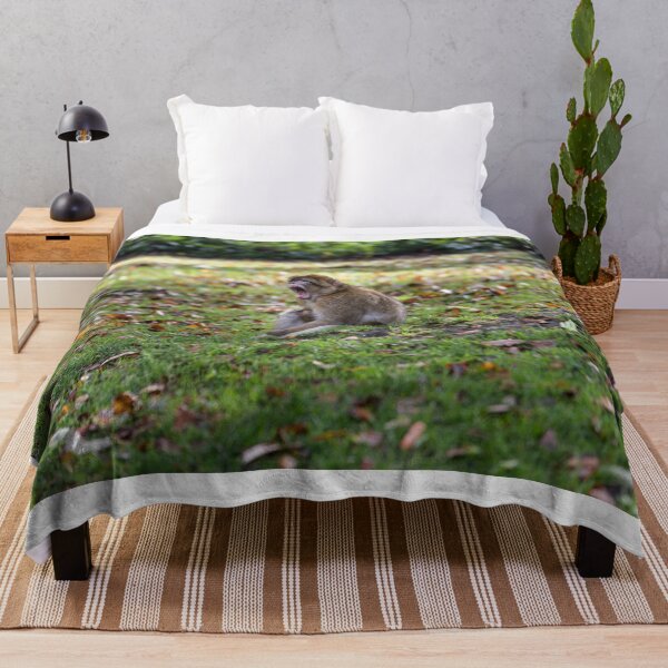 Item preview, Macaco gritando en un claro del bosque designed and sold by David Patterson.