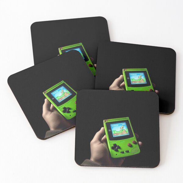 Item preview, Hand holding Green Gameboy Color designed and sold by teesresolution.