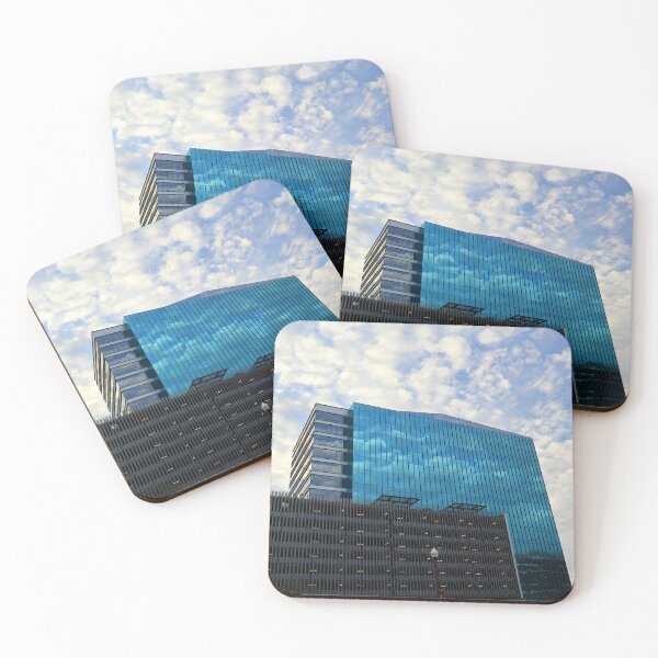 Item preview, Skyscraper in the cloudy blue sky designed and sold by Phakade's Photos.