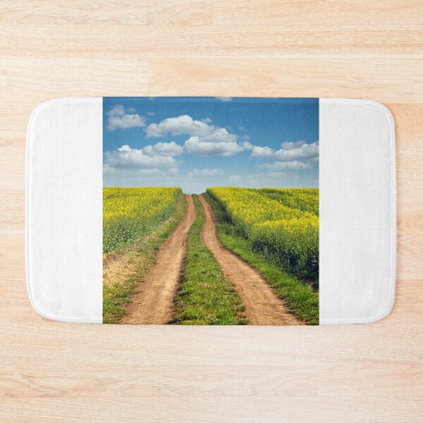 Item preview, Dirt road in oilseed crop field landscape spring season designed and sold by goceris.