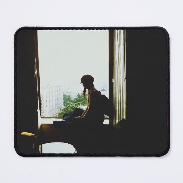 Item preview, blurred photo, drama themes of A traveler wearing a hat and a backpack sits by the window, looking out at the view. designed and sold by pipikijung.
