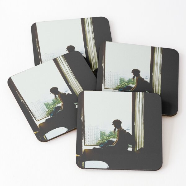 Item preview, blurred photo, drama themes of A traveler wearing a hat and a backpack sits by the window, looking out at the view. designed and sold by pipikijung.