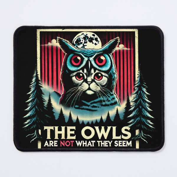 Item preview, The Owls Are Not What They Seem: Cat in an owl costume eerie Twin Peaks artwork funny shirt designed and sold by Dollycat Industries.