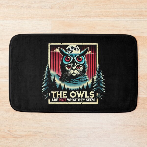 Item preview, The Owls Are Not What They Seem: Cat in an owl costume eerie Twin Peaks artwork funny shirt designed and sold by Dollycat Industries.