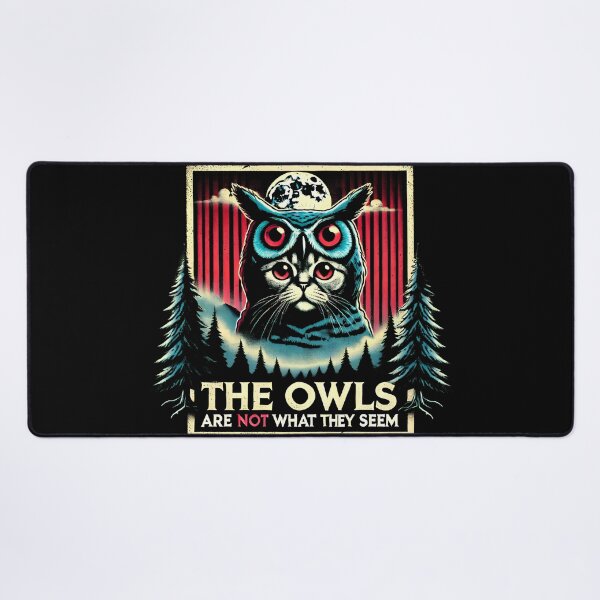 Item preview, The Owls Are Not What They Seem: Cat in an owl costume eerie Twin Peaks artwork funny shirt designed and sold by Dollycat Industries.