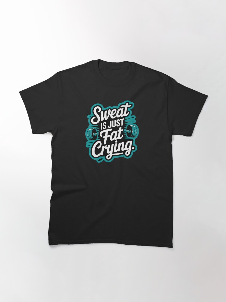 Imagen 3 de 7, Camiseta clásica con la obra Gimnasio motivacional / Llorando gorda, conquistando metas, diseñada y vendida por Hostar2024.