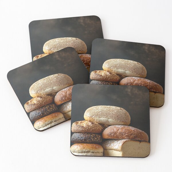 Item preview, Assortment of freshly baked breads of different types stacked on a dark background designed and sold by Jerhus.