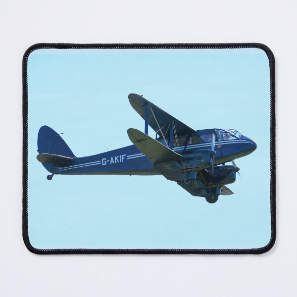 Aperçu de l'œuvre Le De Havilland DH89a Dragon Rapide G-AKIF vole au-dessus créée et vendue par MartinPhotos.