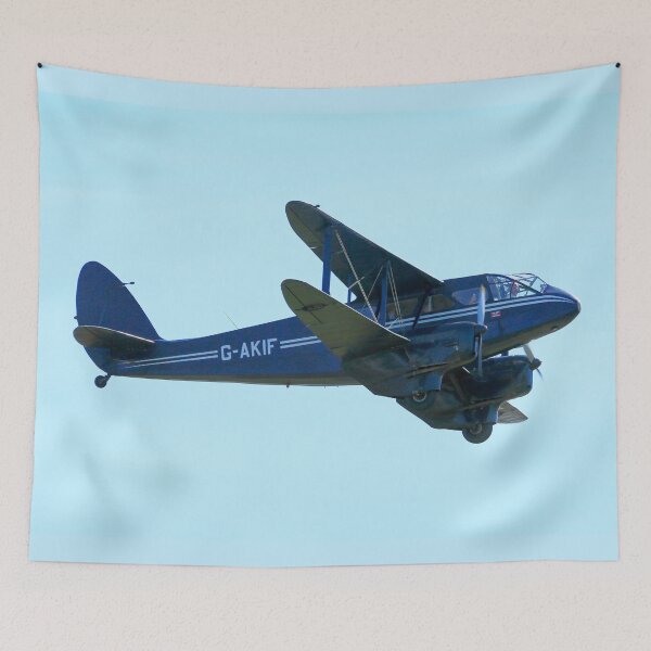 Aperçu de l'œuvre Le De Havilland DH89a Dragon Rapide G-AKIF vole au-dessus créée et vendue par MartinPhotos.
