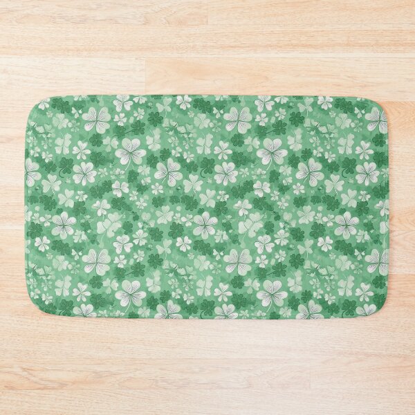 Item preview, shamrock clovers in white and green on a pastel green background designed and sold by Designbes.