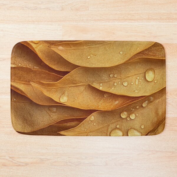 Item preview, Close-up of golden leaves with water droplets, creating a textured and natural composition in soft lighting designed and sold by anytka.