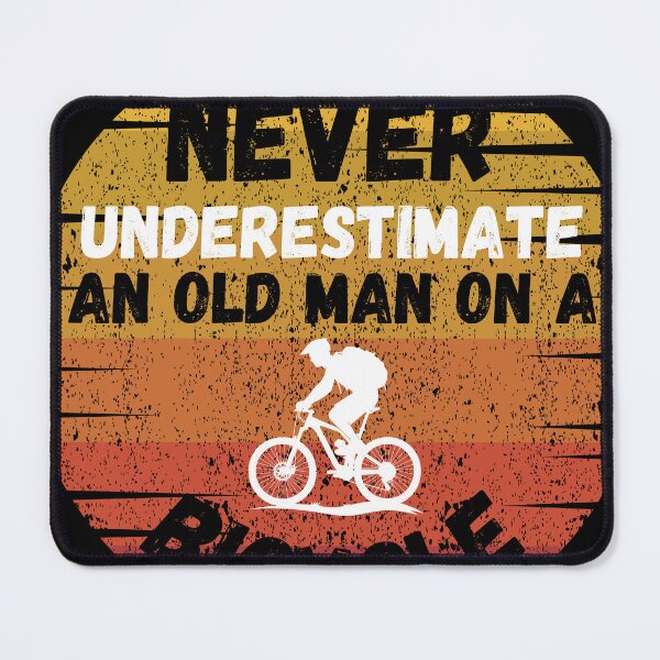 Item preview, Never underestimate an old man on a bicycle designed and sold by Trekwise Apparel.