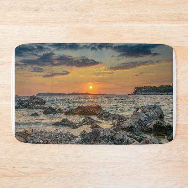 Item preview, Sunset over rocky beach designed and sold by vedadc.