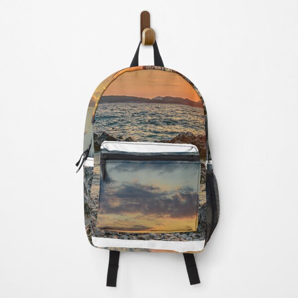 Item preview, Sunset over rocky beach designed and sold by vedadc.