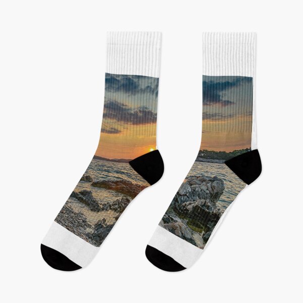 Item preview, Sunset over rocky beach designed and sold by vedadc.