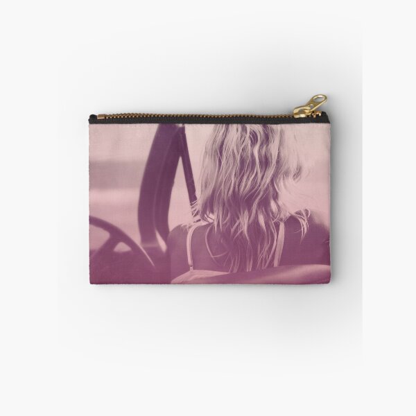 Item preview, Pink-Tinted Blond Woman in Classic Convertible Looks Out Onto the Ocean designed and sold by CountyKent.