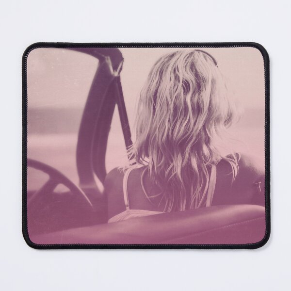 Item preview, Pink-Tinted Blond Woman in Classic Convertible Looks Out Onto the Ocean designed and sold by CountyKent.