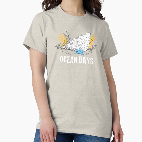 Artikel-Vorschau von Ocean Days – T-Shirt mit grafischem Stranddesign, designt und verkauft von Hostar2024.