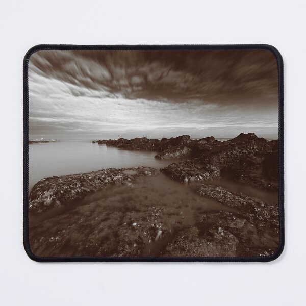 Item preview, Scenic Coastal Rock Formation Under a Vibrant Cloudy Sky in sepia designed and sold by FotoMahieu.