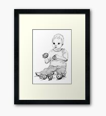 Boy with apples Framed Print