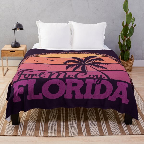Item preview, Fort McCoy Florida Retro Sunset Local Pride Logo designed and sold by CRHPOD20.