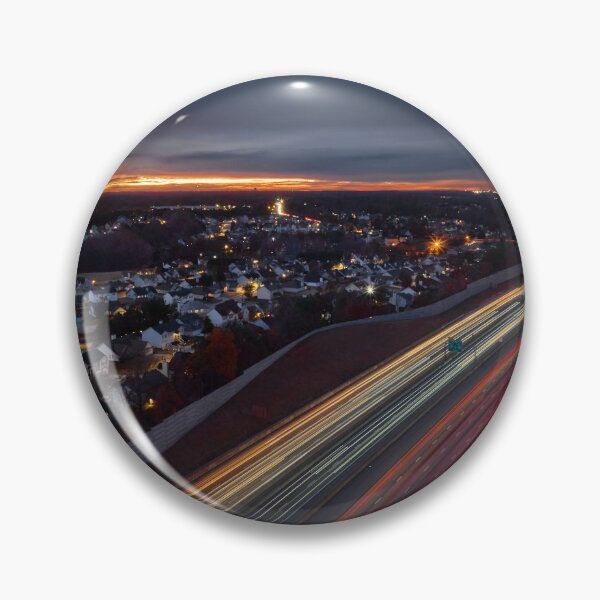 Item preview, An orange sunset and the light trails of vehicles. designed and sold by lessplay.