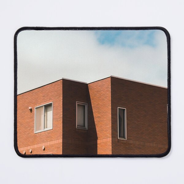 Item preview, An architectural shot of a modern building with a textured brown facade designed and sold by BARTISTA DESIGN.
