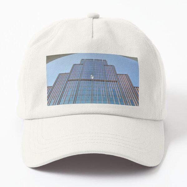 Item preview, A low-angle view of a modern skyscraper, framed by an arched architectural detail designed and sold by BARTISTA DESIGN.