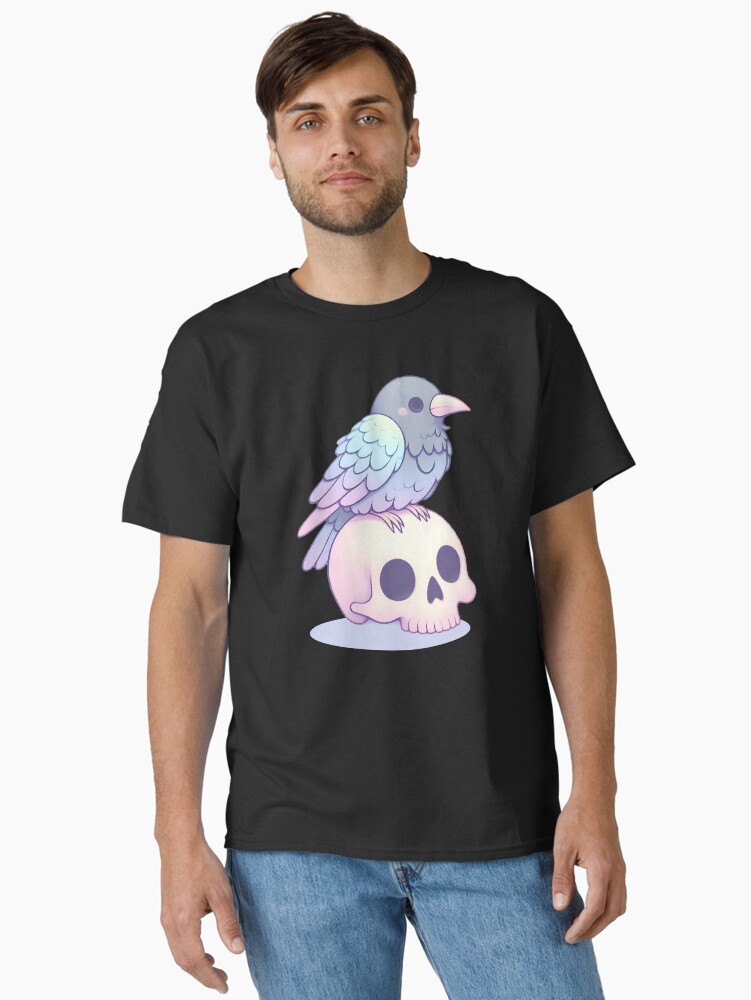 Thumbnail 1 of 7, Classic T-Shirt, Pastel Cute Crow on a Skull - Spooky & Adorable Aesthetic designed and sold by Kawaii-n-Spice.