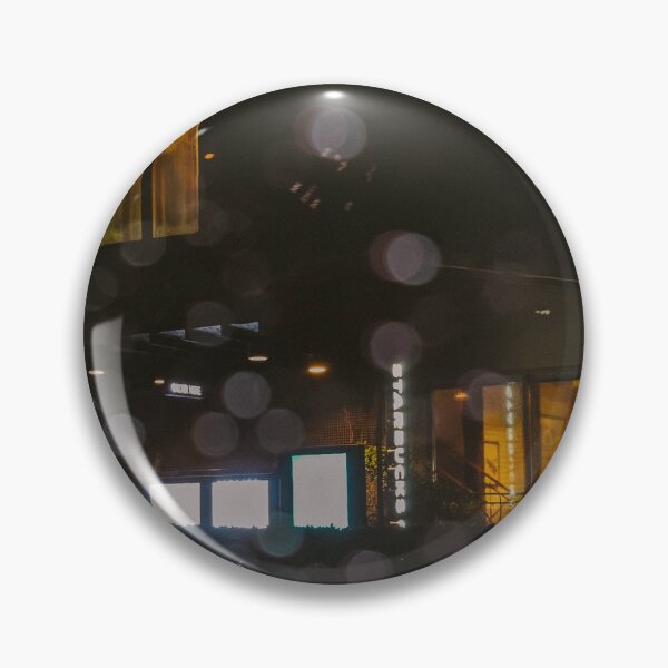 Item preview, A blurry, atmospheric shot of a Starbucks storefront at night, seen through a rain-streaked window. designed and sold by BARTISTA DESIGN.