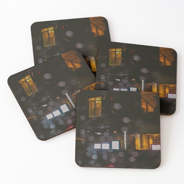 Item preview, A blurry, atmospheric shot of a Starbucks storefront at night, seen through a rain-streaked window. designed and sold by BARTISTA DESIGN.