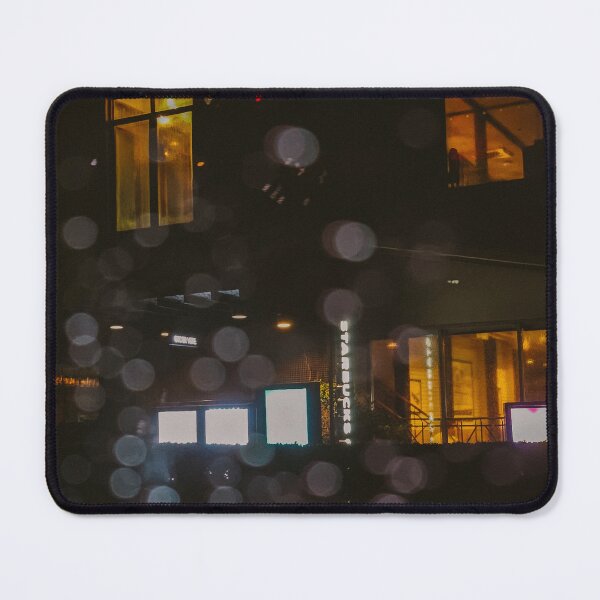 Item preview, A blurry, atmospheric shot of a Starbucks storefront at night, seen through a rain-streaked window. designed and sold by BARTISTA DESIGN.