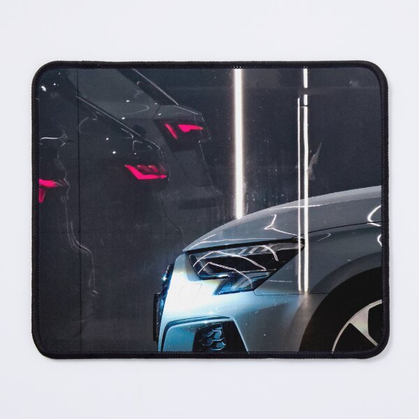 Item preview, A close-up shot of a silver Audi A3 parked in a showroom, with its reflection visible in the glass behind it designed and sold by BARTISTA DESIGN.