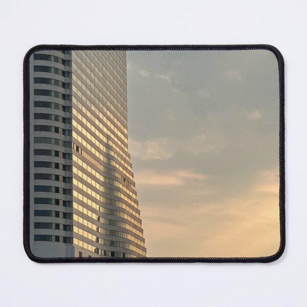 Item preview, A low-angle shot of the Millennium Hilton Bangkok hotel, illuminated by the warm light of the setting sun designed and sold by BARTISTA DESIGN.