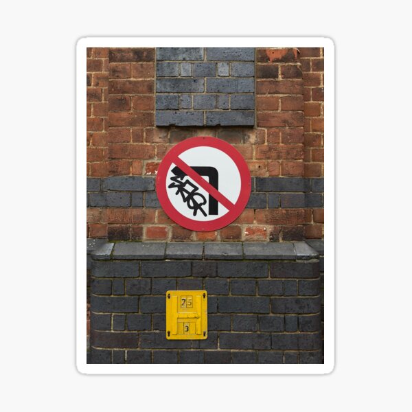 no left turn, bold primaries against black and brown brick Sticker