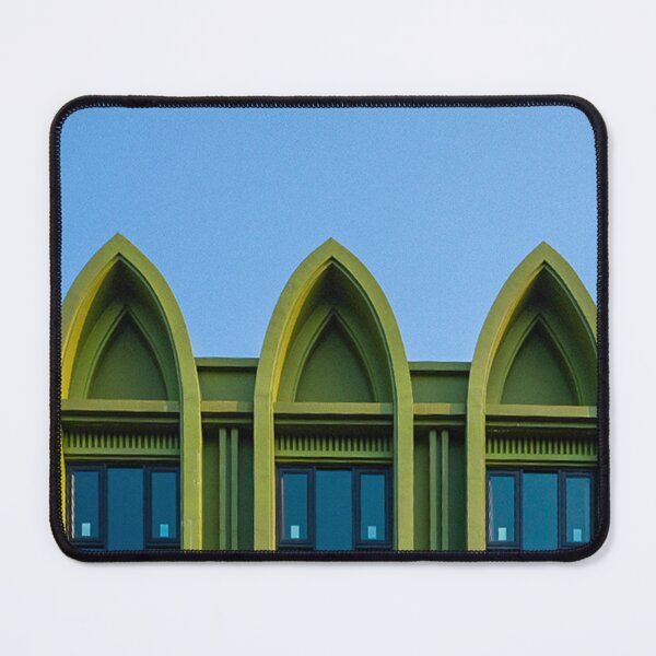 Item preview, A low-angle shot captures the facade of an olive-green building featuring three repeated Gothic arch designs, each encasing dark rectangular windows. designed and sold by BARTISTA DESIGN.