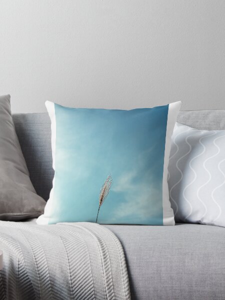 Item preview, A minimalist shot of a single, slender stalk of ornamental grass against a clear, bright blue sky. The grass, with its feathery texture, stands out against the solid, cloudless backdrop designed and sold by BARTISTA DESIGN.