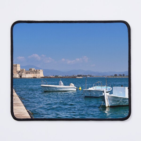 Item preview, Small fishing boats and Bourtzi fortress in Nafplio, Peloponnese, Greece,summertime designed and sold by goceris.