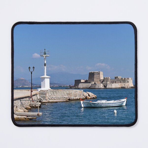 Item preview, Small fishing boat and Bourtzi fortress in Nafplio, Peloponnese, Greece,summertime designed and sold by goceris.