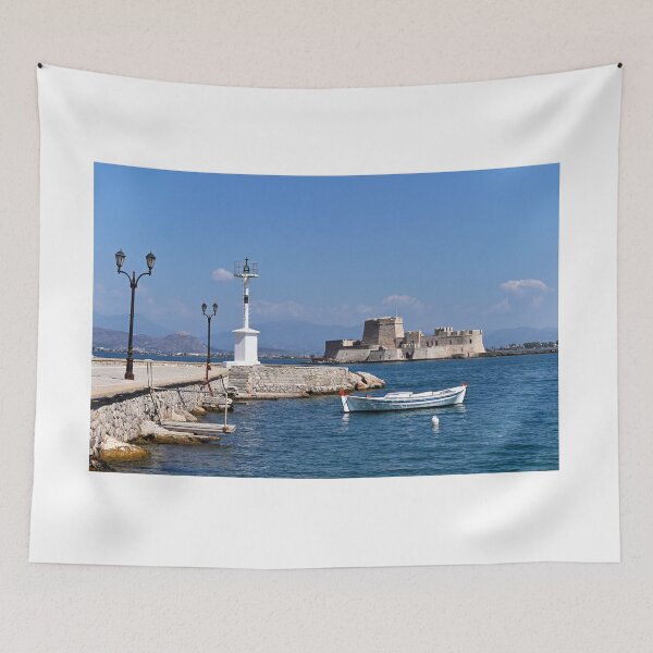 Item preview, Small fishing boat and Bourtzi fortress in Nafplio, Peloponnese, Greece,summertime designed and sold by goceris.