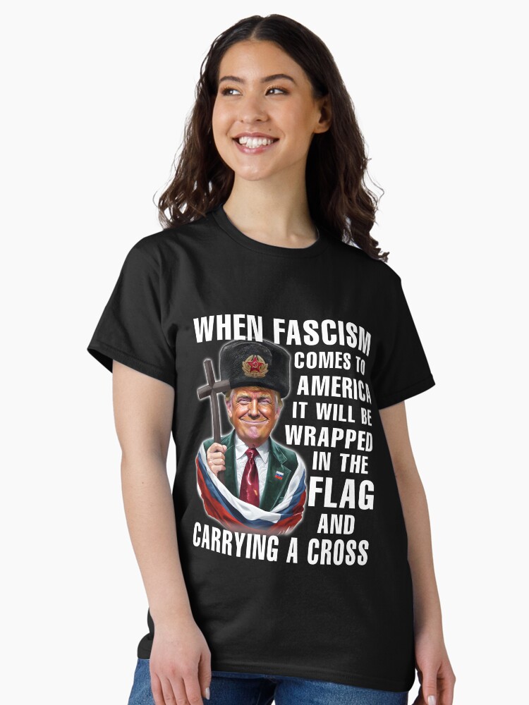 Thumbnail 1 of 7, Classic T-Shirt, When Fascism Comes To America Anti Trump Sticker designed and sold by EthosWear.