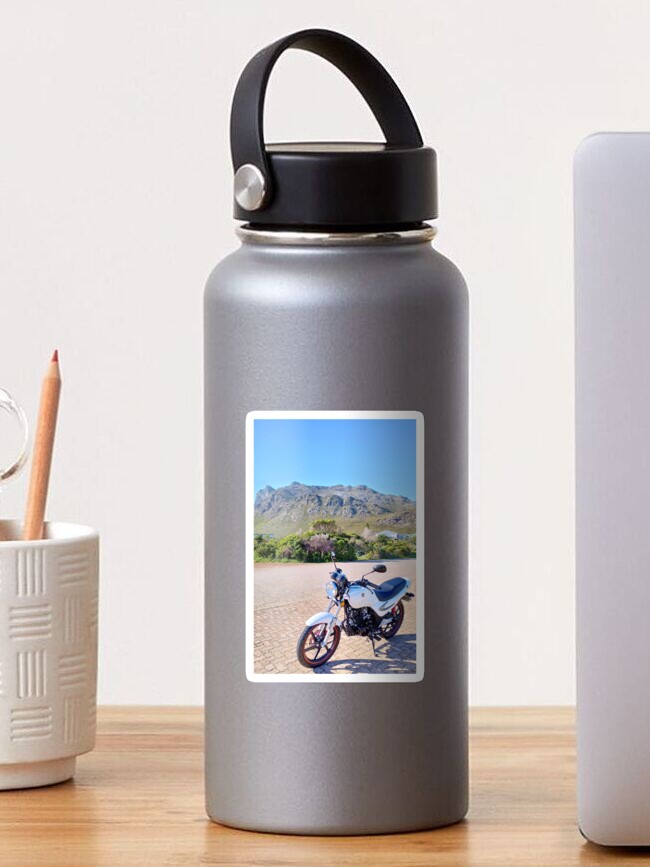 Thumbnail 1 of 3, Sticker, White Commuter Motorcycle With Mountain Backdrop designed and sold by Seasons-Waiting.