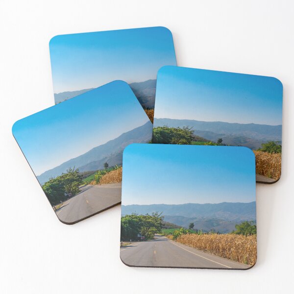 Item preview, Empty road and mountains against clear blue sky designed and sold by PitakChai93.
